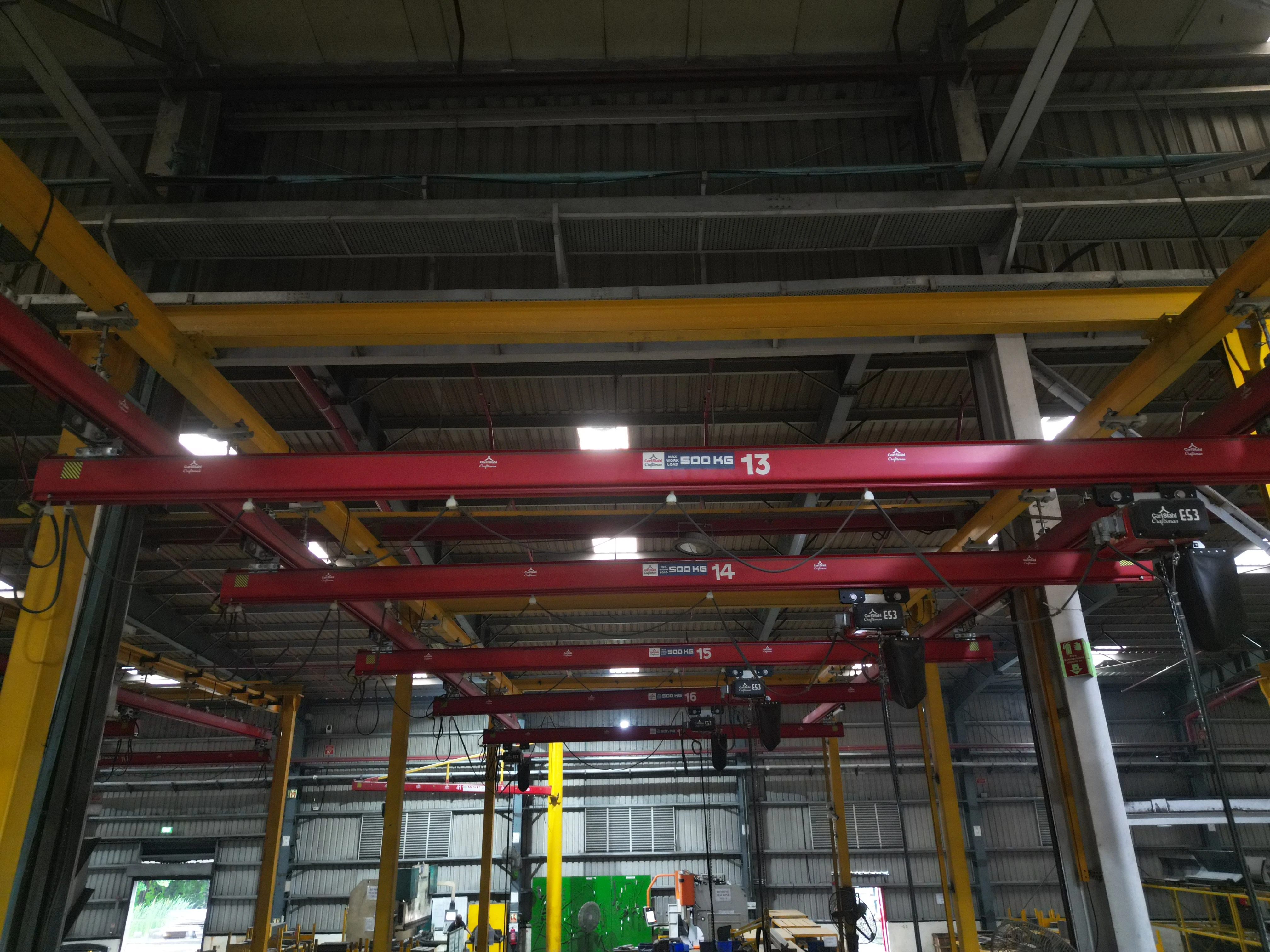 Double girder light crane system for wider span material handling
