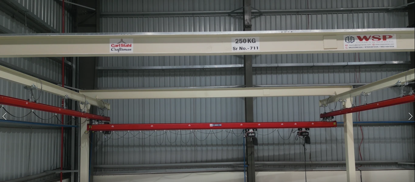 Suspended light crane system for efficient workstation coverage